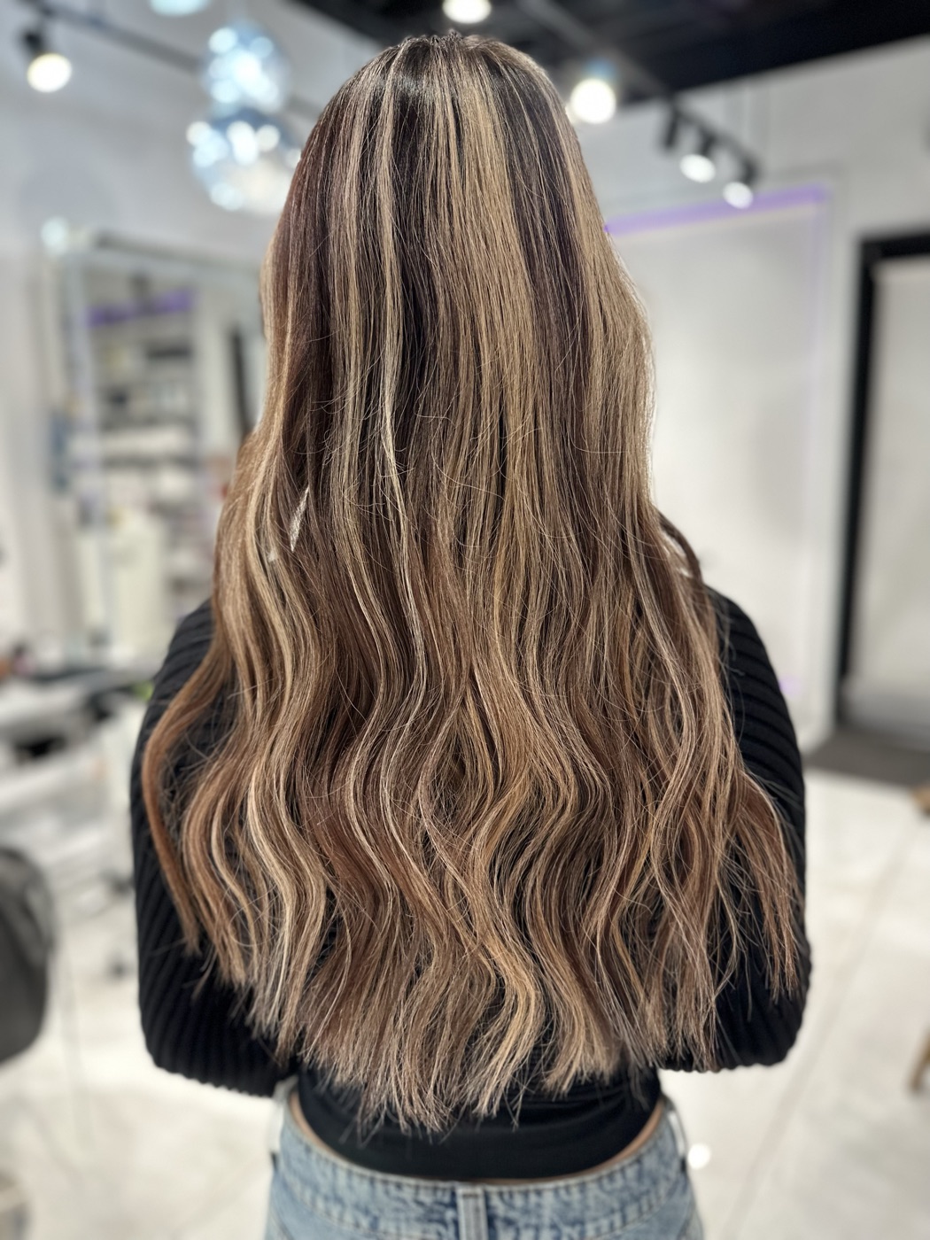Long dark hair with soft blonde dimension