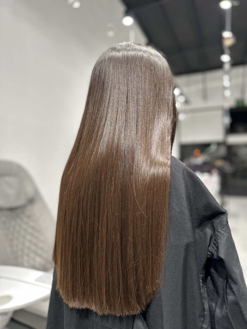 Long sleek light brunette hair