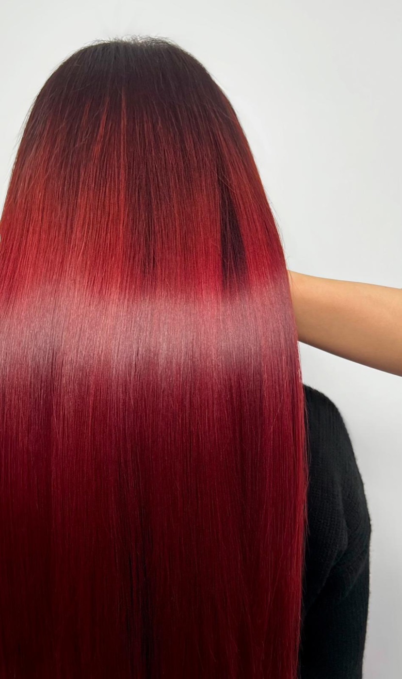 Long straight hair with red ombre coloring