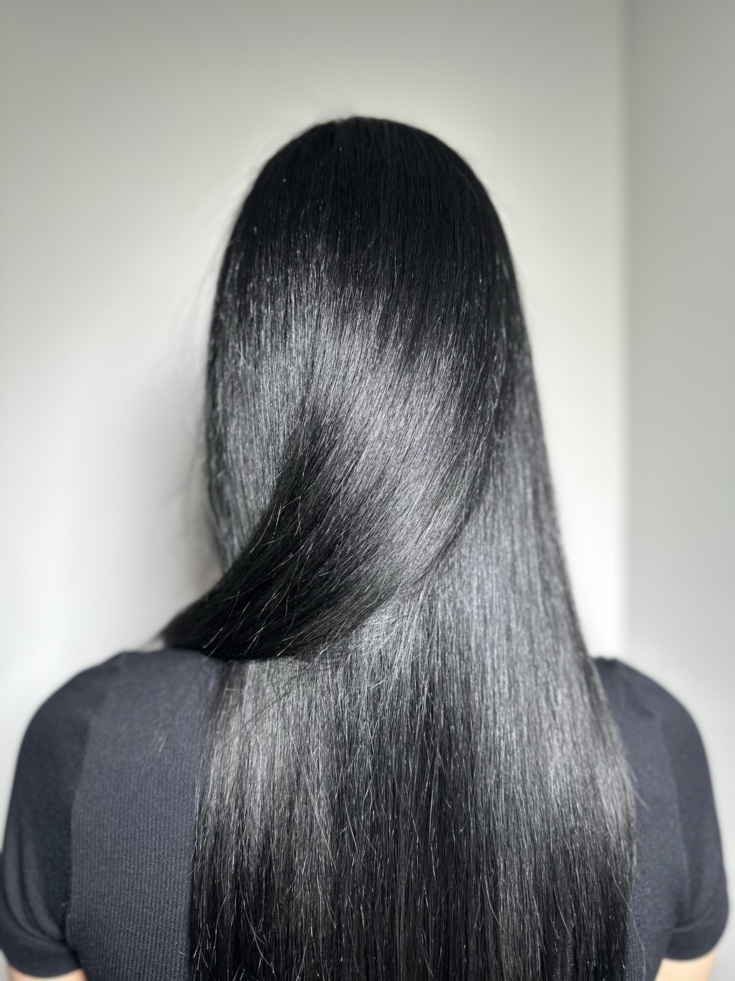 Long sleek black hair, back view, alternate angle