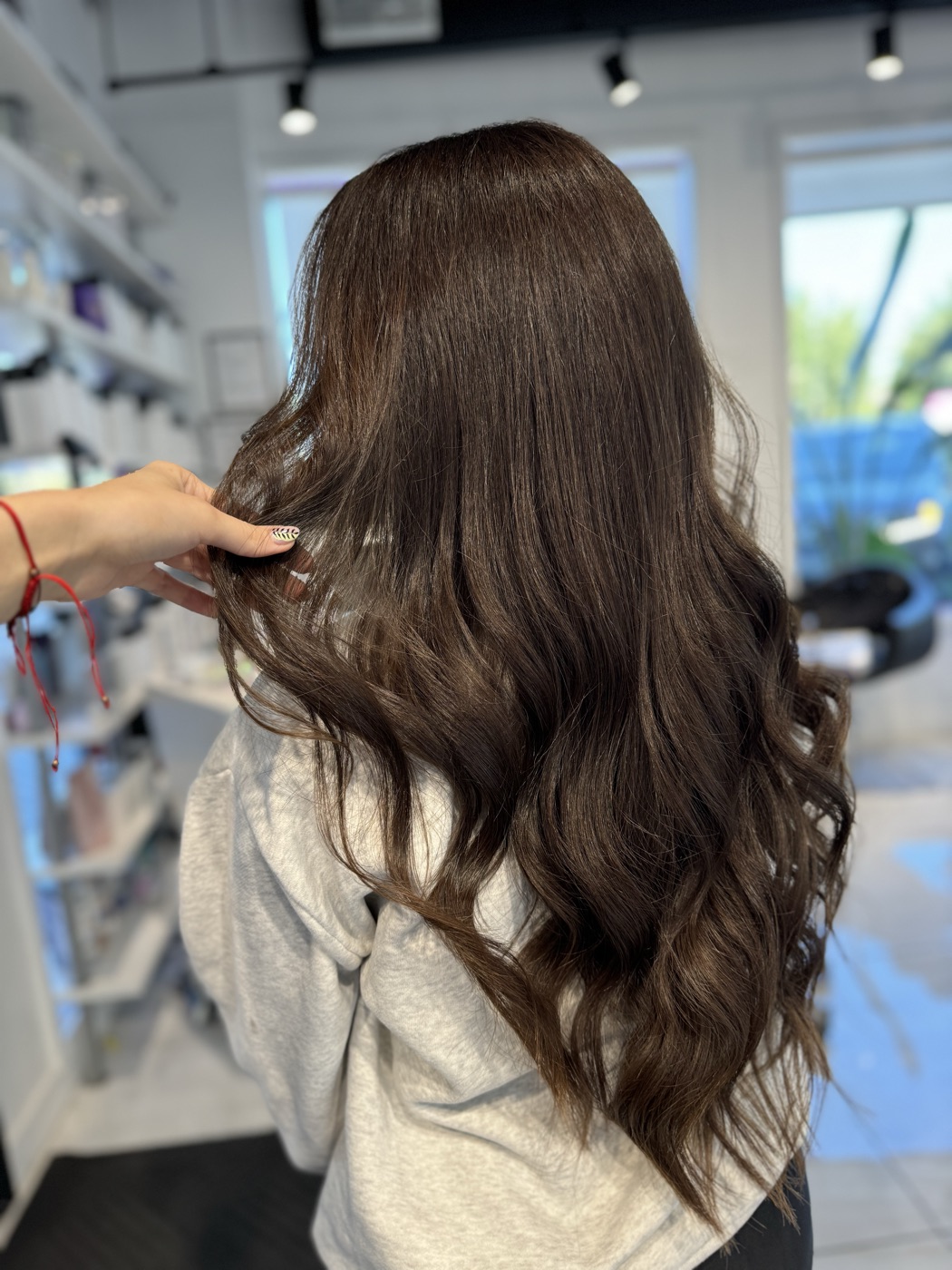 Long chocolate-brown wavy hair, alternate angle